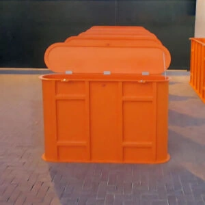 Heavy-duty GRP containment barriers with flip-top lids for site safety