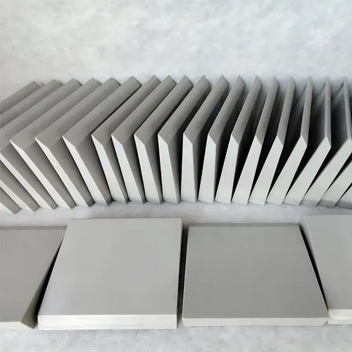 Flat white GRP fiberglass sheets stacked for industrial use